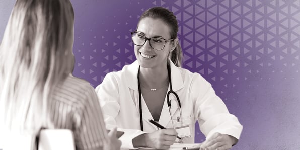 Doctor smiling at patient